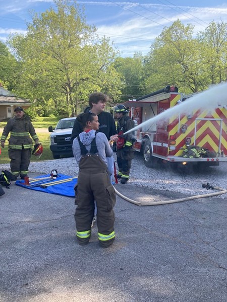 The students and teacher tried on firefighter outfits and hats, learned how to use a fire extinguisher, and practiced spraying the fire hoses. Thank you to Career Coach Deana Reno for helping to coordinate this presentation. 